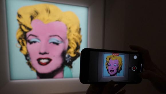 Las Marilyn de Warhol se han convertido en símbolo de la cultura americana del show business y una reflexión irónica sobre la fama y el estrellato. (Foto: Timothy A. Clary / AFP)