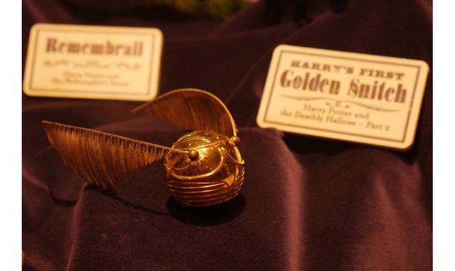 La Golden Snitch, la pelota principal del juego de 'quidditch' que practican los aprendices de mago en Hogwarts.