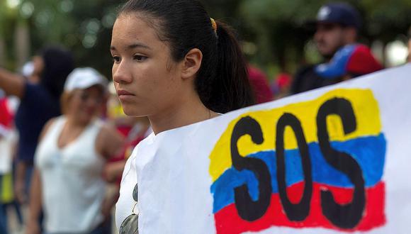 Decenas de venezolanos en varios países de América se vuelcan a las calles para exigir la salida de Nicolás Maduro. (Foto: EFE)