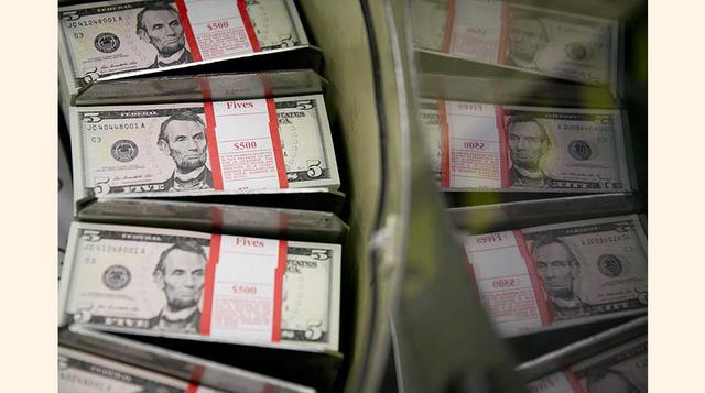 14. Dólar de EE.UU.: Las monedas de países desarrollados subirían aún más debido al mayor gasto, posiblemente después del impacto inicial. (Foto: Bloomberg)