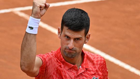 El serbio Novak Djokovic celebra después de derrotar al británico Cameron Norrie en su partido de la cuarta ronda del torneo masculino de tenis ATP Rome Open en el Foro Italico de Roma el 16 de mayo de 2023. (Foto de Tiziana Fabi / AFP)