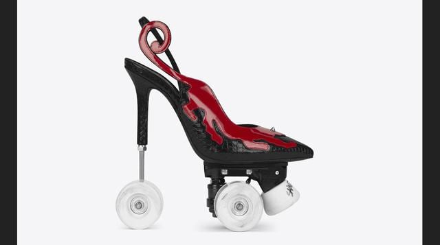 FOTO 3 | Los "stilettos" combinan brillantes rayas de rosado, dorado y azul contra un lienzo negro, con otros elementos de diseño sensuales en exhibición. (Foto: Megaricos)