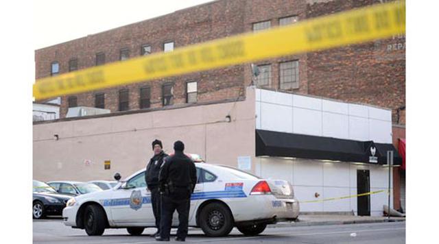 Baltimore, Estados Unidos. Homicidios: 211. Población: 622.104. Tasa de homicidios: 33.912. En la imagen: Oficiales de la policía de Baltimore hace guardia junto a la escena de un tiroteo matutino. (Foto: AP)