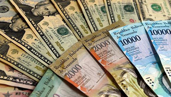 Con la eliminación de seis ceros al valor nominal del bolívar, el Banco Central de Venezuela ya ha suprimido 14 ceros en los últimos 13 años. (Foto: AFP).