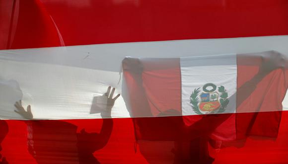 El congreso de la República propuso declarar feriado el 7 de junio con motivo de la batalla de Arica y el Día de la bandera (Foto: Luka Gonzales/ AFP)