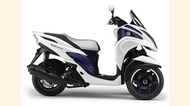 YAMAHA TRICITYPrimer vehículo de tres ruedas de la marca japonesa, busca clientela ajena al mundo de las motos pero cansada de los atascos.Precio 4.000 euros. (Foto: 20minutos)