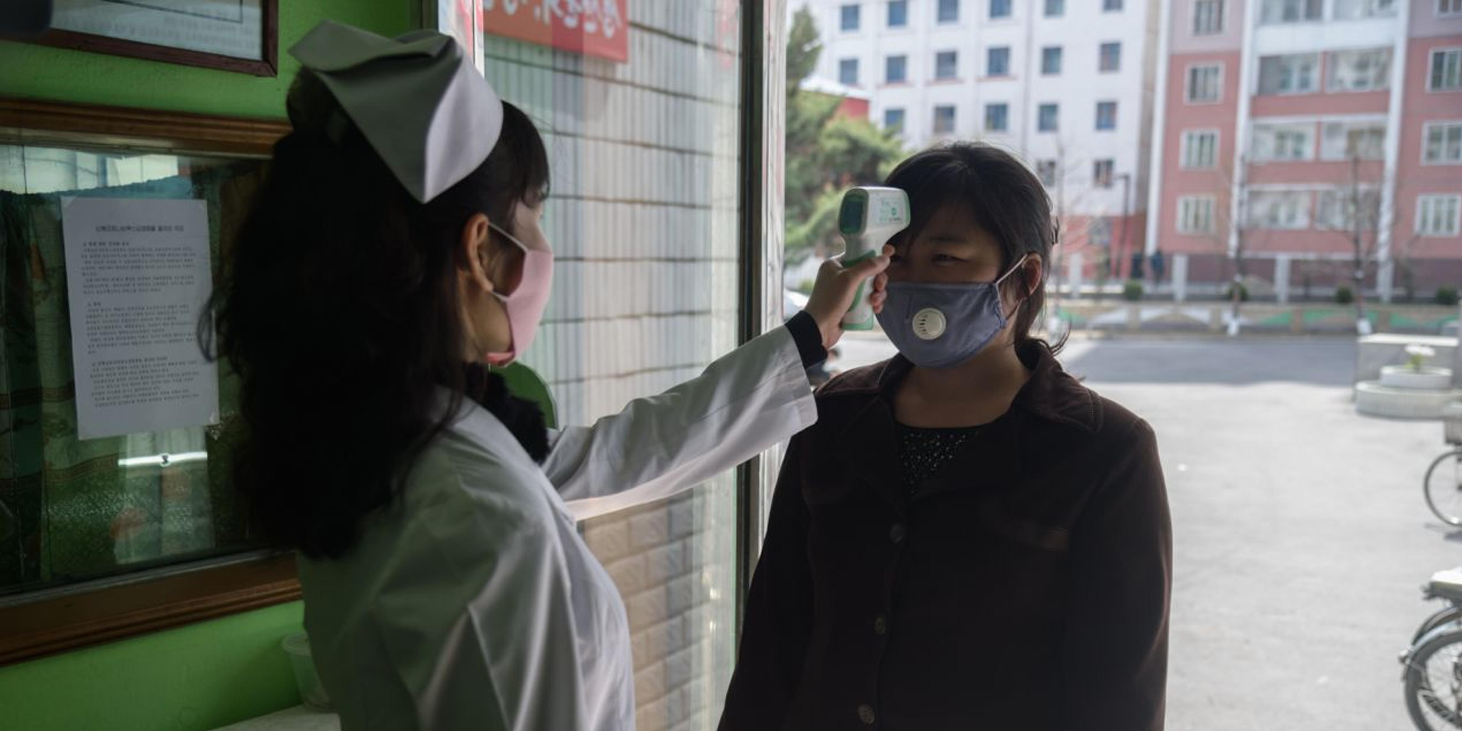 FOTO 1 | Corea del Norte
El férreo régimen norcoreano es uno de los países que todavía no ha reportado ni un solo caso de coronavirus. En este sentido, su aislamiento internacional le ha podido beneficiar. (Photo by KIM WON JIN/AFP via Getty Images)