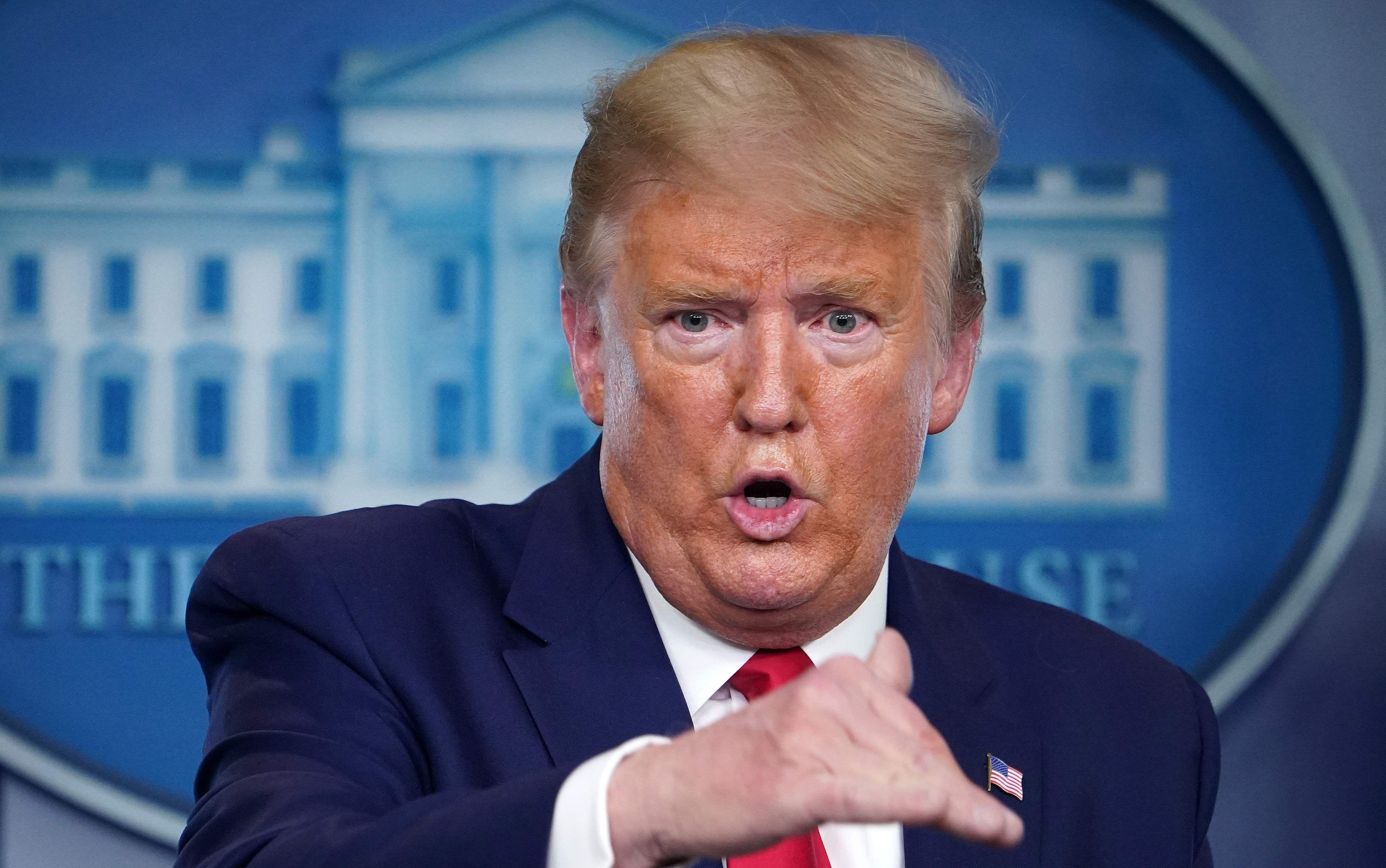 “Respecto al tema de saber si sus cifras son correctas, yo no soy un contador chino”, dijo Donald Trump. (AFP / MANDEL NGAN).