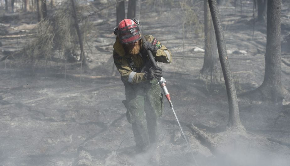 With hundreds of active fires, Canada faces enormous logistical challenges