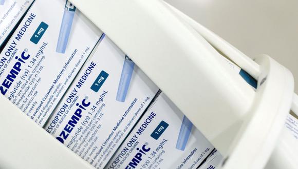 Packets of Ozempic move along a conveyor at the Novo Nordisk A/S production facilities in Hillerod, Denmark, on Tuesday, Sept. 26, 2023. Novo's Ozempic and Wegovy injectable drugs, a class of medicines known as GLP-1s, have been causing ripple effects across the stock market, for the makers of everything from snacks to booze.