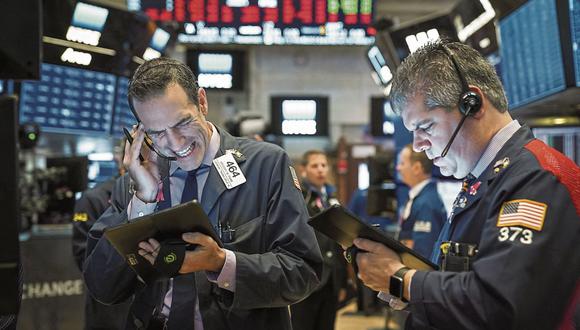 Wall Street sigue apostando por vender acciones y acudiendo a valores más seguros como la deuda pública. (Foto: Getty Images/AFP)