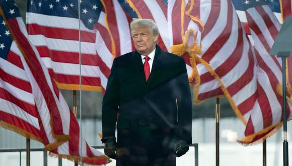 El presidente de Estados Unidos, Donald Trump, se dirige a sus seguidores cerca de la Casa Blanca. (Foto de Brendan Smialowski / AFP).