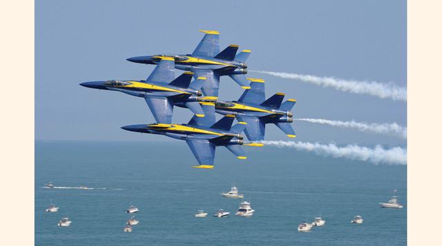 En esta foto del 14 de junio del 2015 proporcionada por la Marina de los EE.UU., los Blue Angels realizan una presentación en Ocean City, MD. Un grupo de élite de fotógrafos de la Marina son seleccionados cada año para viajar por el mundo con el equipo de