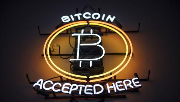 A neon sign indicates that Bitcoin is accepted inside the venue of the Paralelni Polis project, an organization combining art, social sciences and modern technology, in Prague, Czech Republic, on Friday, Jan. 5, 2024. Bitcoin has been on a tear ahead of an upcoming Jan. 10 deadline that could see the US Securities and Exchange Commission approve the first exchange-traded fund tied directly to the assets spot price. Photographer: Milan Jaros/Bloomberg