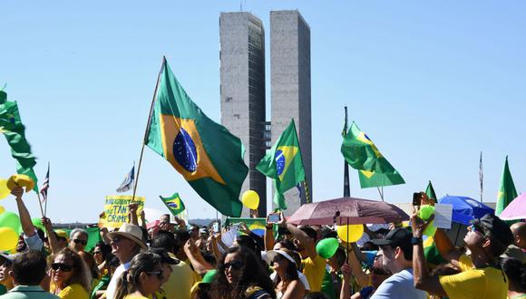 Bolsonaro señaló, durante un culto evangélico en Río de Janeiro, que las manifestaciones "no eran a favor del presidente" y "sí del futuro" del país. (Foto: AFP)