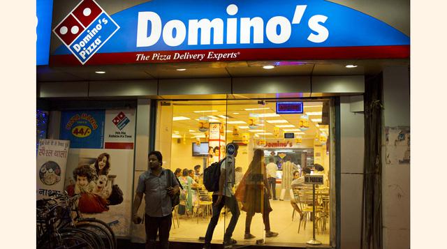 Domino’s. La firma que recientemente cerró sus operaciones en el Perú vendió US$ 4,100 millones en EE.UU. durante el 2014, superando a Papa John’s por unos US$ 1,500 millones. (Foto: Bloomberg)