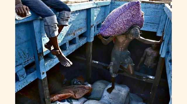 Ekho Ardiyanto ganó en la región de Asia Oriental y el Pacífico con una imagen tomada en un barco de Indonesia. (Foto: CGAP)