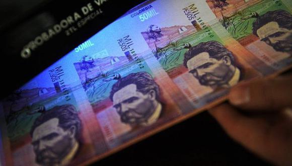 Pesos colombianos se ha visto afectado por el coronavirus, según LAECO. (Getty Images)