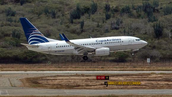 Un avión de Copa Airlines aterriza en el Aeropuerto Internacional Simón Bolívar en Maiquetía, Venezuela. (Foto: Bloomberg)