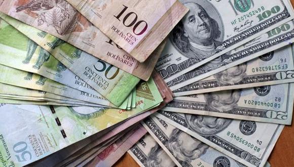 El sector privado ha encontrado maneras de operar en medio de una dolarización parcial que permitió el ilegítimo gobierno de Nicolás Maduro sortear el efecto de las sanciones financieras impuestas por Estados Unidos. (Foto: AFP)