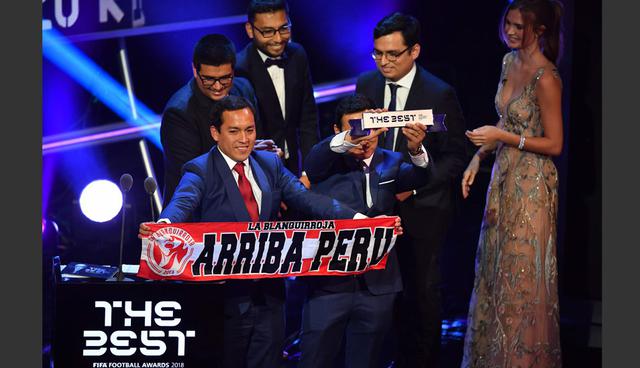 FOTO 8 | Premio a la afición de la FIFA: Perú.
(Foto: AFP)