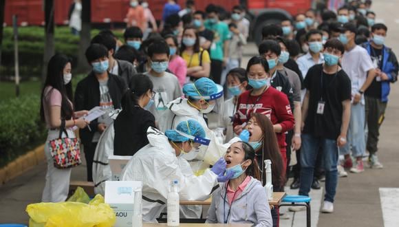 Se cree que la pandemia se originó el año pasado en esta ciudad industrial, que estuvo 76 días bajo una estricta cuarentena para frenar los contagios. (STR / AFP).
