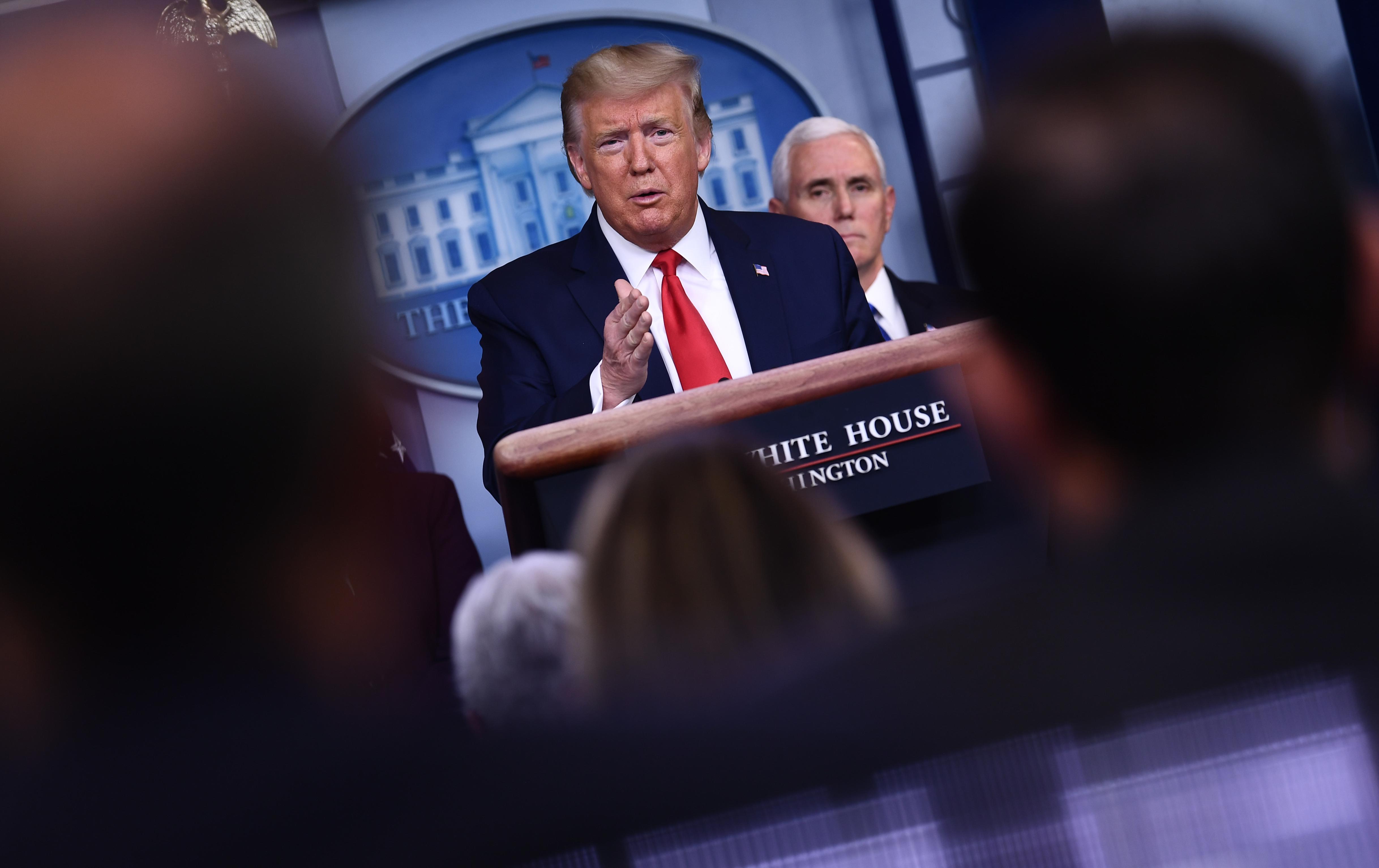 El presidente Donald Trump ha sido duramente criticado por científicos. (Brendan Smialowski / AFP)