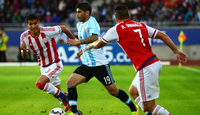 Éver Banega |Otro volante que iría desde el arranque es Éver Banega, quien juega por el Sevilla de España.  Está valorizado en más de 8 millones de dólares. (AFP)