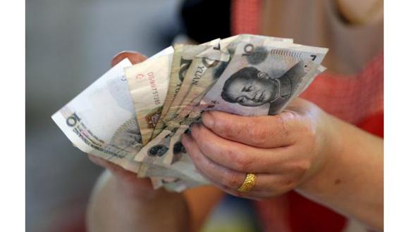 "La señal de que China en cierta forma no está dispuesta a continuar permitiendo una caída del yuan más allá de las 7 unidades por dólar es constructiva desde la perspectiva transversal de los activos", dijo un analista de estrategias cambiarias de CIBC Capital Markets en Toronto. (Foto: Reuters)