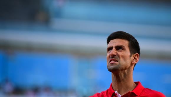 Los australianos rechazaron la decisión de otorgar una exención a Djokovic, lo que causó que el primer ministro Scott Morrison cambiara su postura. (Photo by MARTIN BUREAU / AFP)