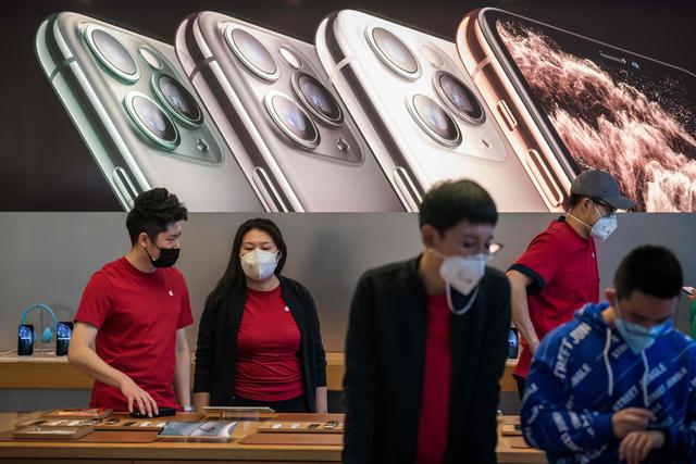 La compañía Foxconn, principal proveedor mundial de componentes electrónicos a empresas como Apple y que tiene varias unidades de producción en Wuhan, no reabrirá sus fabricas en China antes de mediados de febrero. (Foto: AFP)