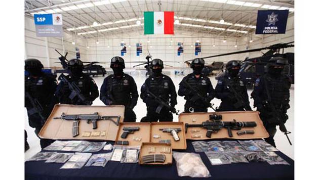 Chihuahua, México. Homicidios: 289. Población: 868.145. Tasa de homicidios: 33.29. En la imagen: La policía federal presenta armas secuestradas durante un operativo contra el sospechado líder del cartel de droga "Gente Nueva" en Chihuahua. (Foto