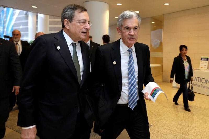 Mario Draghi y Jerome Powell.