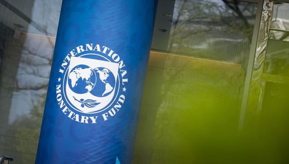 Signage outside the International Monetary Fund (IMF) headquarters in Washington, D.C., U.S., on Tuesday, April 19, 2022. The IMF slashed its world growth forecast by the most since the early months of the Covid-19 pandemic, and projected even faster inflation, after Russia invaded Ukraine and China renewed virus lockdowns. Photographer: Al Drago/Bloomberg