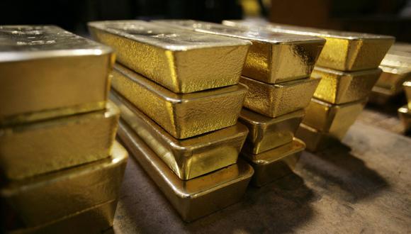El FMI no tiene potestad para comprar oro ni participar en transacciones con oro, tales como préstamos o arrendamientos, pero puede vender oro directamente a los precios vigentes en el mercado. (Photo by SEBASTIAN DERUNGS / AFP)