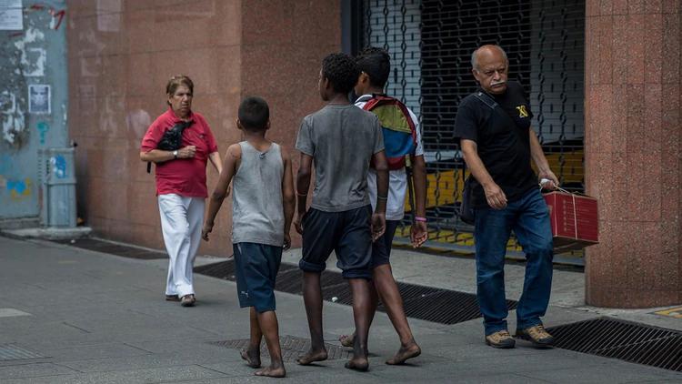 Cientos de miles de niños venezolanos esperan el reencuentro con sus padres. (Foto: EFE)