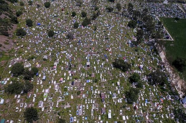 This aerial photo shows a municipal pantheon in Valle de Salco, Mexico, in the midst of a COVID-19 corona virus infection.  (Photo by PEDRO PARDO / AFP)