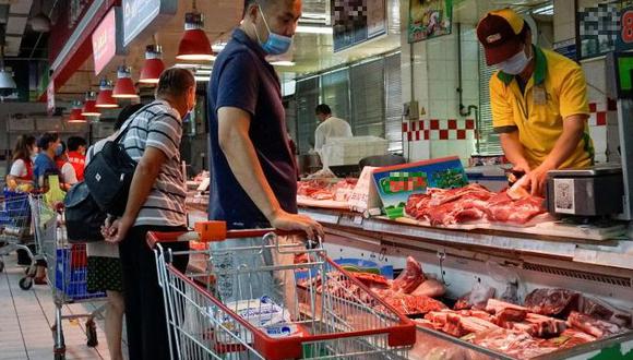 Porcicultores evalúan venta directa al consumidor para competir con mejores precios (Foto: AFP).