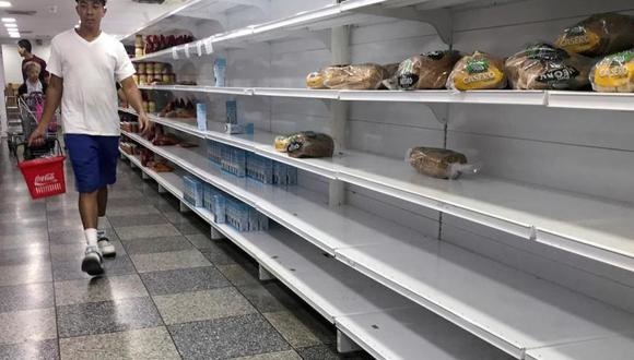 FOTO 1 | A la caza de productos básicos en los supermercados (FOTO: REUTERS)
