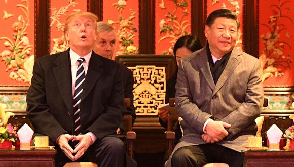 En el 2017, el presidente Donald Trump visitó a su homólogo chino, Xi Jinping, antes de que la guerra comercial y el coronavirus apartara a ambos líderes. AFP