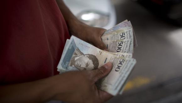 La moneda venezolana cerrará el año con una inflación de 1'000,000%. (Foto: AP)