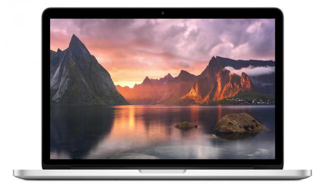 MacBook Pro de Apple. El delgado diseño de metal y de vidrio negro de la MacBook Pro la convierte en un laptop súper elegante y hermosa.