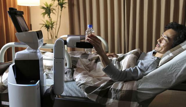 FOTO 7 | Robot de Asistencia a Humanos de Toyota. Una robot con un brazo móvil que puede acercar objetos, recogerlos del suelo y desplazarse. Puede asistir a enfermos en hospitales o servir como servicio doméstico.