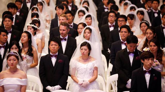 FOTO 1 | Aldedor de 4,000 parejas de 64 países intercambiaron votos matrimoniales en este evento.