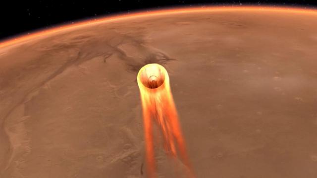 La impresión de este artista obtenida de la NASA muestra la entrada, el descenso y el aterrizaje de InSight en Marte. La sonda InSight entrará a gran velocidad en la atmósfera de Marte, que tiene una densidad equivalente a 1% de la Tierra.