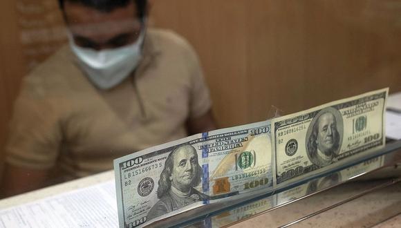 El dólar acumula una ganancia de 12.77% en el mercado local en lo que va del 2021. (Foto: AFP)