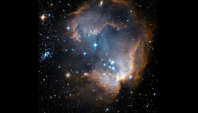 El telescopio Hubble también registró imágenes de la Pequeña Nube de Magallanes. Es una galaxia irregular que se encuentra a unos 200 mil años luz de la Tierra. (Hubble Space)