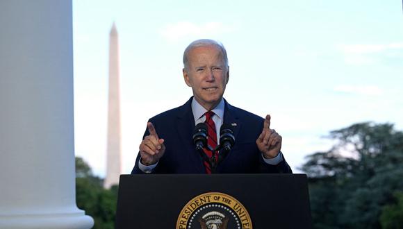 “En este momento histórico, los demócratas se pusieron del lado del pueblo estadounidense y todos los republicanos se pusieron del lado de los intereses especiales”, dijo Biden. (JIM WATSON / POOL / AFP).