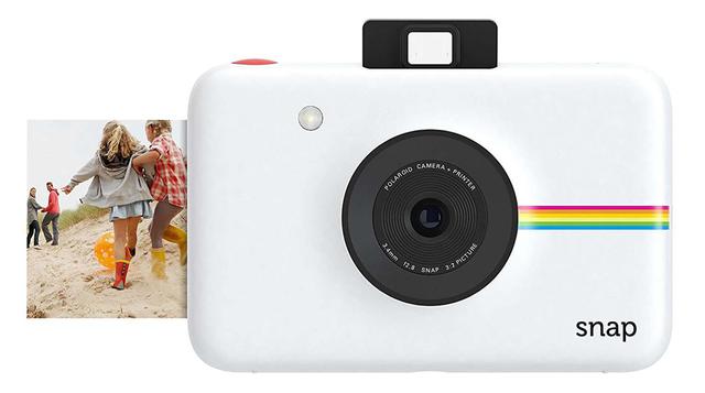 Polaroid Snap: Para Instagramers Sin Remedio. Polaroid tiene el regalo vintage perfecto para estas Navidades: una cámara digital en cuyo diseño se condensa toda su historia. El truco, por supuesto, es que la cámara imprime las fotografías al momento, al e