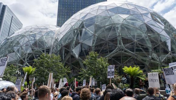 Amazon employees during a walkout outside the Amazon Spheres, part of the Amazon headquarters campus, in Seattle, Washington, US, on Wednesday, May 31, 2023. The Amazon.com Inc. employees are demanding more flexibility with remote work and more attention on Amazon's climate impact.